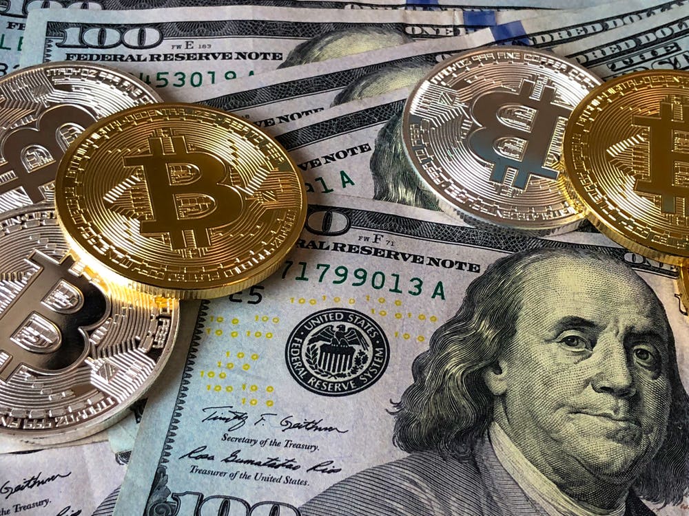 Dólares e bitcoins: ganhar dinheiro com Bitcoin em 2021