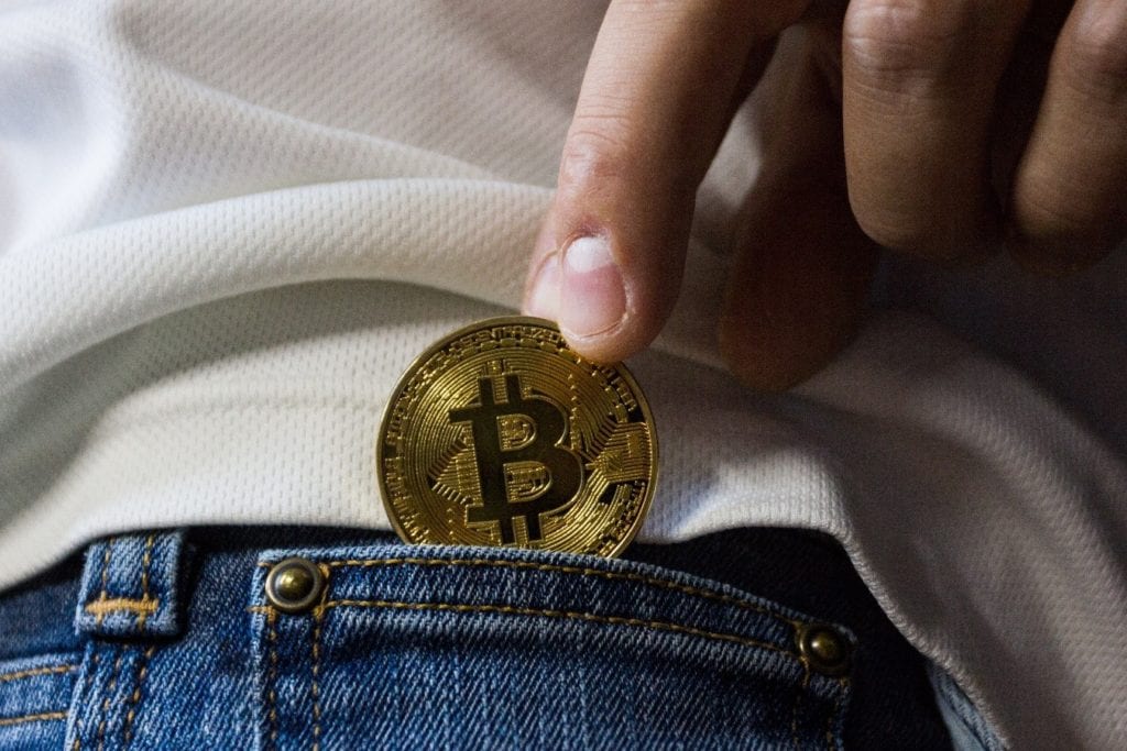 Retirando Bitcoin do bolso: pagamento em Bitcoin